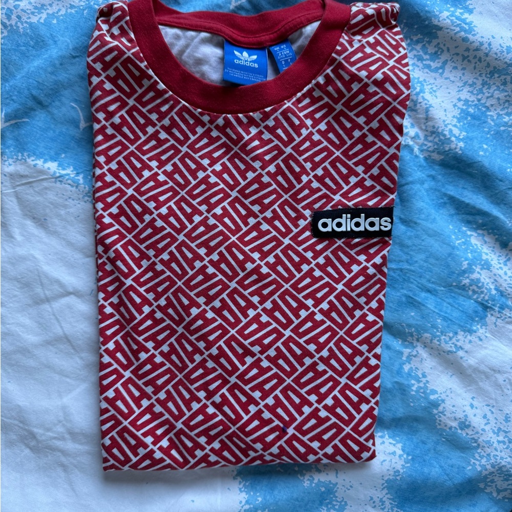 Adidas Red and White Short Sleeve Tee with Sporty Geometric Design